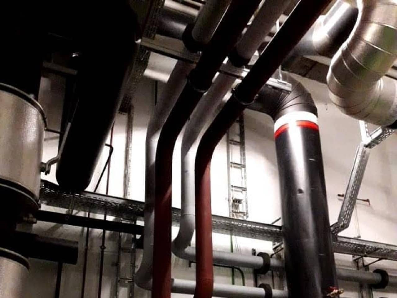 Installation réseau chaud et froid dans un bâtiment international, Neotech Energies, expert chauffagiste Genève