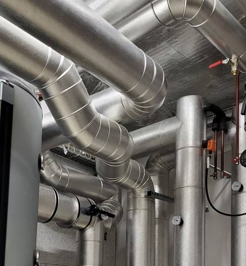 Installation tuyauterie pompe à chaleur, Neotech Energies, expert chauffagiste Genève